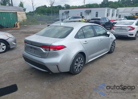 2021 Toyota Corolla Hybrid Le from USA, damaged, VIN JTDEAMDEXMJ022331